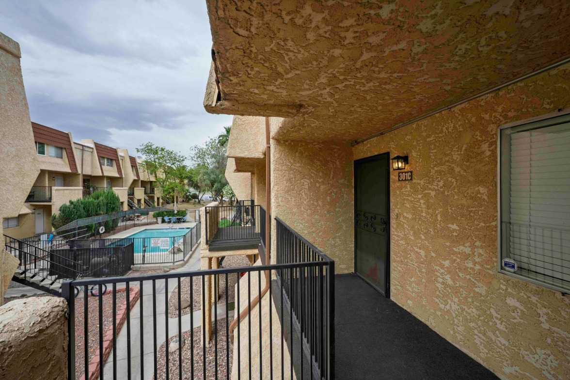 1303 Darlene Way Unit 301C Boulder City NV — balcony view of community pool